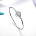 Minimalist 925 silver bracelet featuring a round cutout charm with brilliant cubic zirconia - Platinum Plated Hollow Ring Main Diamond Bangle 5.5g
