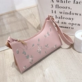 Elegant pink lace shoulder bag with floral embroidery and gold hardware detail - Pink