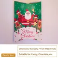 Christmas pillow candy box with Santa and reindeer patterns for holiday gifts, size 16x11cm - Santa and Deer