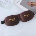 3D contoured sleep mask in brown memory foam with golden eyelash patterns on white fur - Gold Stamping Eyelash Style / Coffee