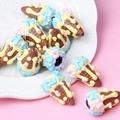 Close-up of hand-painted colorful ice cream cone acrylic beads for DIY jewelry making - 1 Piece / Pointed Coffee + Blue Cream