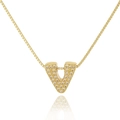 Macro shot of gold V-letter pendant with micro-pave sparkling crystals on box chain - Letter V
