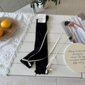 Ballet style black ribbed leg warmers with white silk ribbon bow and dainty lace decor - One Size / Black