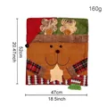 Christmas reindeer chair cover in brown plush with festive plaid pattern, size 52x47cm - Reindeer