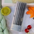 Morandi grey gradient gel pens set with fruit icons in a clear plastic box - Grey Series