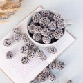 Frosted pine cones and dried fruit pods in a white ceramic bowl for Christmas decor - Brushed White Liquidambar Fruit (10pcs)