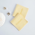 Golden square hoop pearl earrings set with branded pale yellow microfiber jewelry pouches - Yellow