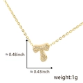 Gold plated letter T pendant necklace with sparkling cubic zirconia on white background - Gold Letter-T