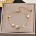Elegant 18k gold plated stainless steel chain bracelet with Roman numeral rings and zircon - Gold Roman Numeral Cylinder Style (582)