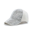 Close-up of sparkling silver rhinestones on a white breathable baseball cap surface - Beige Silver Diamond