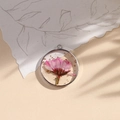 Resin pendant with pink dried flowers, gold flakes, and silver metal frame detail - Pink Gold