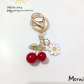 Red cherry pendant keychain with white daisy charm and gold alloy ring accessory - Red Cherry with Daisy and Gold Chain (Cherry I)