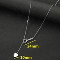 Modern stainless steel necklace with guitar slide and pick pendants on black background - Steel Guitar & Heart