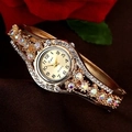 Elegant gold alloy bracelet watch for women with sparkling rhinestones in a luxury finish - White