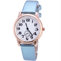 Minimalist women's quartz watch with light blue snakeskin strap and rose gold metal case - Sky Blue