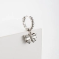 Silver bow-knot hoop earrings with zircon stones on a white minimalist display stand - Bowknot Pendant Style(A170-3#)