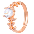 Macro shot of rose gold leaf ring with round cubic zirconia and adjustable band detail - Adjustable Open / Rose Gold