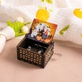 Hand-cranked wooden music box featuring Halloween engravings and vintage scene artwork - Halloween W