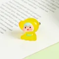 Macro shot of yellow resin mini fruit figure with 3g weight and 19x21mm dimensions - Luminous Mango