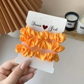 Three-piece vibrant orange satin hair scrunchies with a smooth silky texture and elastic - 3 Piece Set / Orange