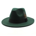 Detail of dark green wool fedora hat featuring black ribbon and decorative feather - Dark Green
