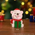 Cartoon Christmas bear resin figurine wearing red hat and scarf holding green gift box - Bear