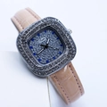 Detail of square silver rhinestone watch with blue glitter dial and beige leather strap - Pink Silver Case