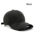 Vintage black washed cotton baseball cap with distressed torn holes and adjustable strap - Black