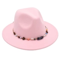 Detail of pink wool fedora hat featuring a beaded cord band and vintage flower pendant - One Size / Pink (Obsidian Decoration)