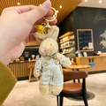 Plush beige rabbit keychain doll in floral shirt and beige overalls with gold ring clasp - Rabbit (Boy)