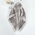 Detail of silver paisley print square silk scarf with fine satin stitched edges - 60x60cm / Gray