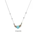 Macro detail of natural light blue Amazonite bead pendant on gold stainless steel chain - Amazonite-Gold Chain