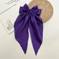 Elegant deep purple satin bow hair clip with long ribbons and a silky finish - Deep purple