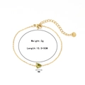 Gold stainless steel bracelet featuring a 7mm green triangle gemstone and extension chain - Gold - Olive Green