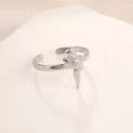 Detailed close-up of a 3D bird sculpture on an adjustable stainless steel ring band - Steel Color Conch