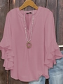 Close-up of pink V-neck blouse featuring elegant multi-layered ruffle cuffs and light fabric - S / Pink