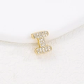 Macro shot of gold-plated letter I pendant with sparkling cubic zirconia pavé setting - I (Single Pendant)
