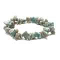 Detailed view of handmade bracelet featuring irregular turquoise and brown stone beads - Amazonite