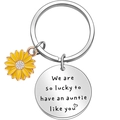 Close-up of stainless steel keychain with sunflower charm and auntie gift engraving - We are so lucky to have an auntie like you ♡