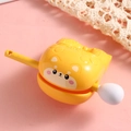 Yellow shiba inu stress relief toy keychain with handle on a soft pink background - Merit Wooden Fish Ornament - Shiba Inu