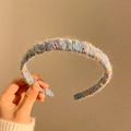 Plush blue knitted headband with colorful polka dots, handmade winter hair accessory - Purple
