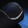 Elegant S925 sterling silver smile necklace with round moissanite stones on black background - 1.1 Carat Moissanite (Platinum Color)