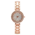 Elegant rose gold women's watch with rhinestone bezel and mother of pearl dial on white background - Rose Gold