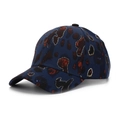 Close-up of baseball cap with red-brown pattern and gold glitter details on navy fabric - Dark Blue Leopard (A)