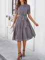 Detail of short-sleeved grey polka dot dress with waist tie and elegant flowy hemline - S / Tops / Gray