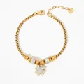 Bracelet chaîne en acier inoxydable doré avec pendentif trèfle à quatre feuilles en cristal - Or + Zirconium blanc