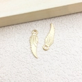 Pair of gold wing-shaped metal charms with intricate feather texture for jewelry making - 1pc Feather Wing Charm