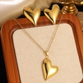 Golden heart jewelry set including necklace and stud earrings with polished metallic finish - Gold Glossy Heart Jewelry Set (Necklace+Earrings)