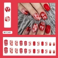Kerst rode plaknagels met hartjes glitters, zuurstok patronen en Ho Ho tekst - 24 Stuks/Doos / W1341 Vrolijk Kerstfeest (Lijm Type)