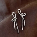 Elegant silver bow earrings with sparkling pave-set zircons and ribbon design - A1424 Silver Ribbon Bow Full Rhinestone Drop Earrings